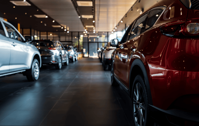 showroom floor of SUVs for sale at an automotive dealership
