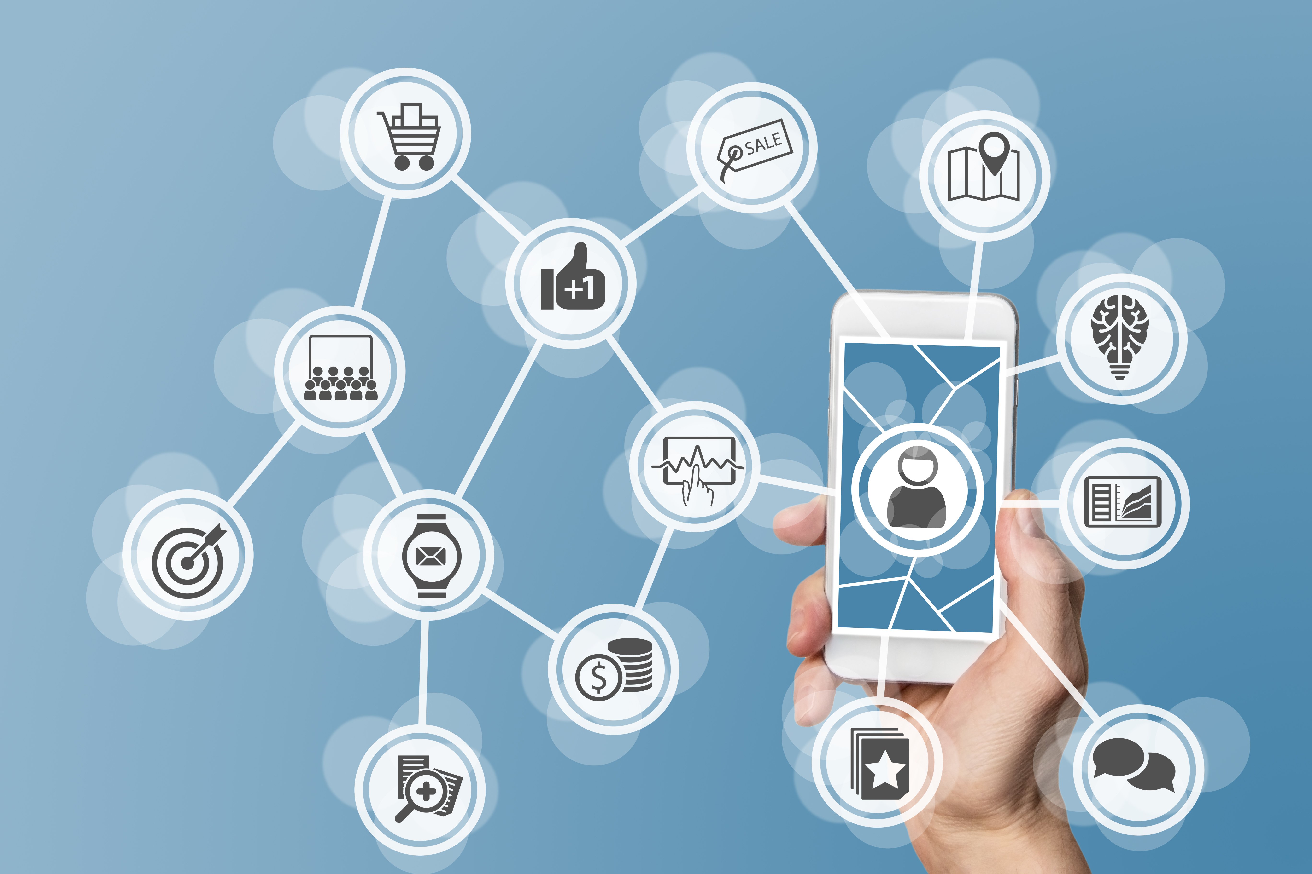 a hand holding a phone is behind a bunch of vector points connecting various forms of data