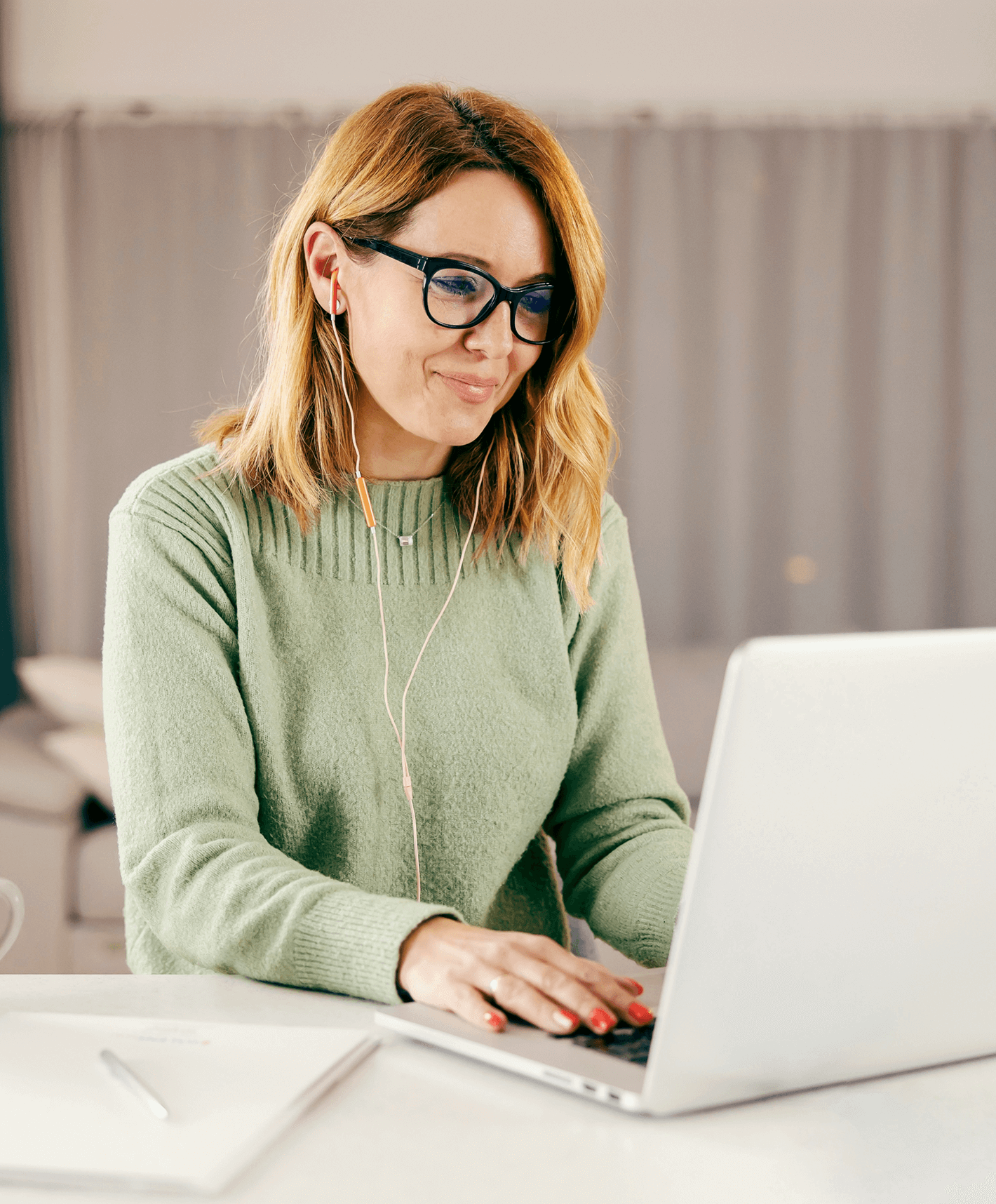 woman on laptop watching online video
