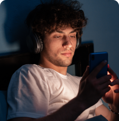 man watching online vide on laptop