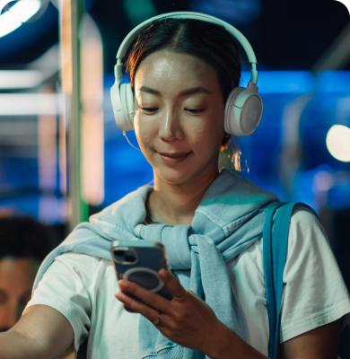 woman listening to streaming audio on phone
